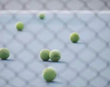 green tennis ball in court
